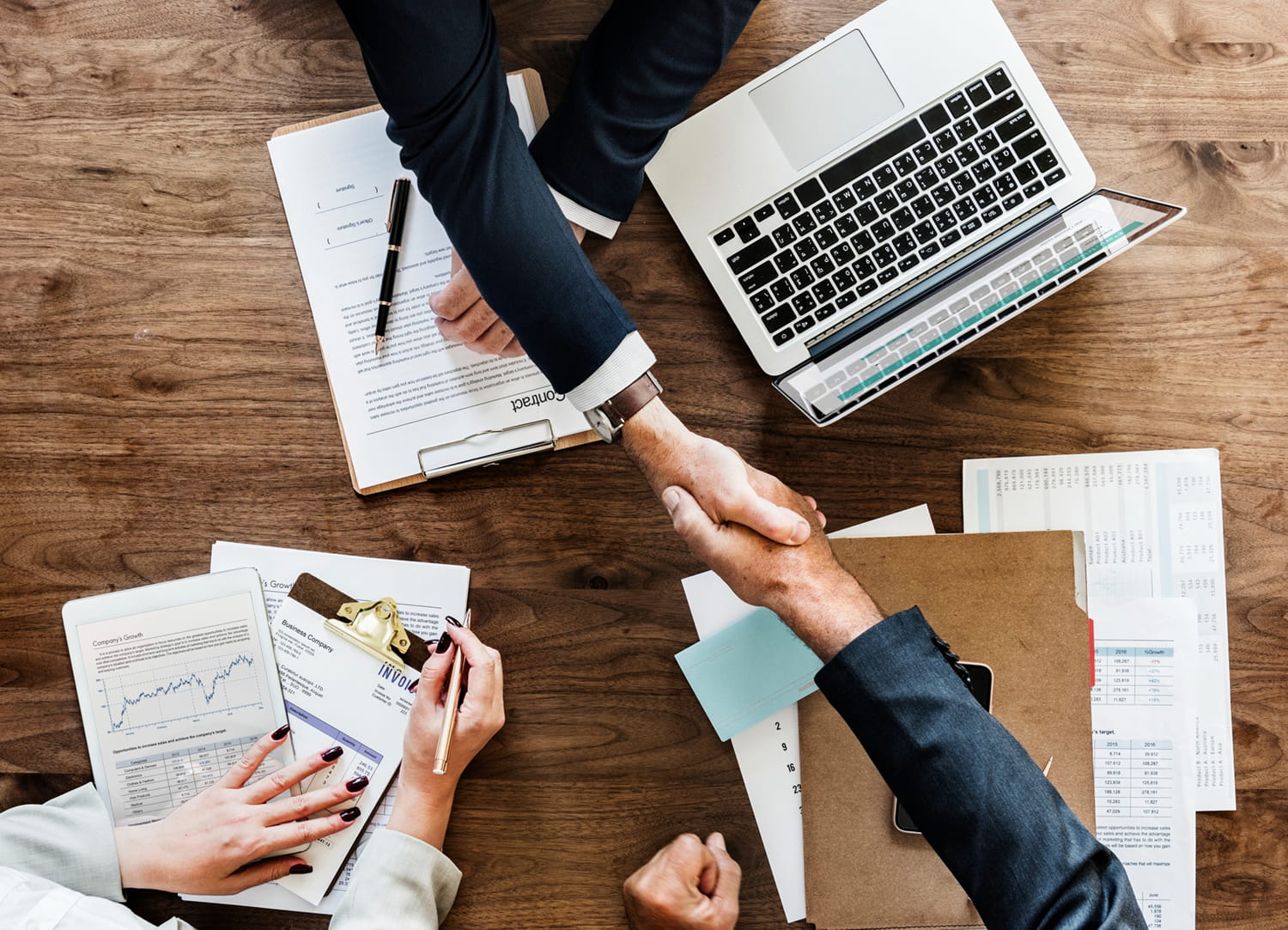 Business people shaking hands